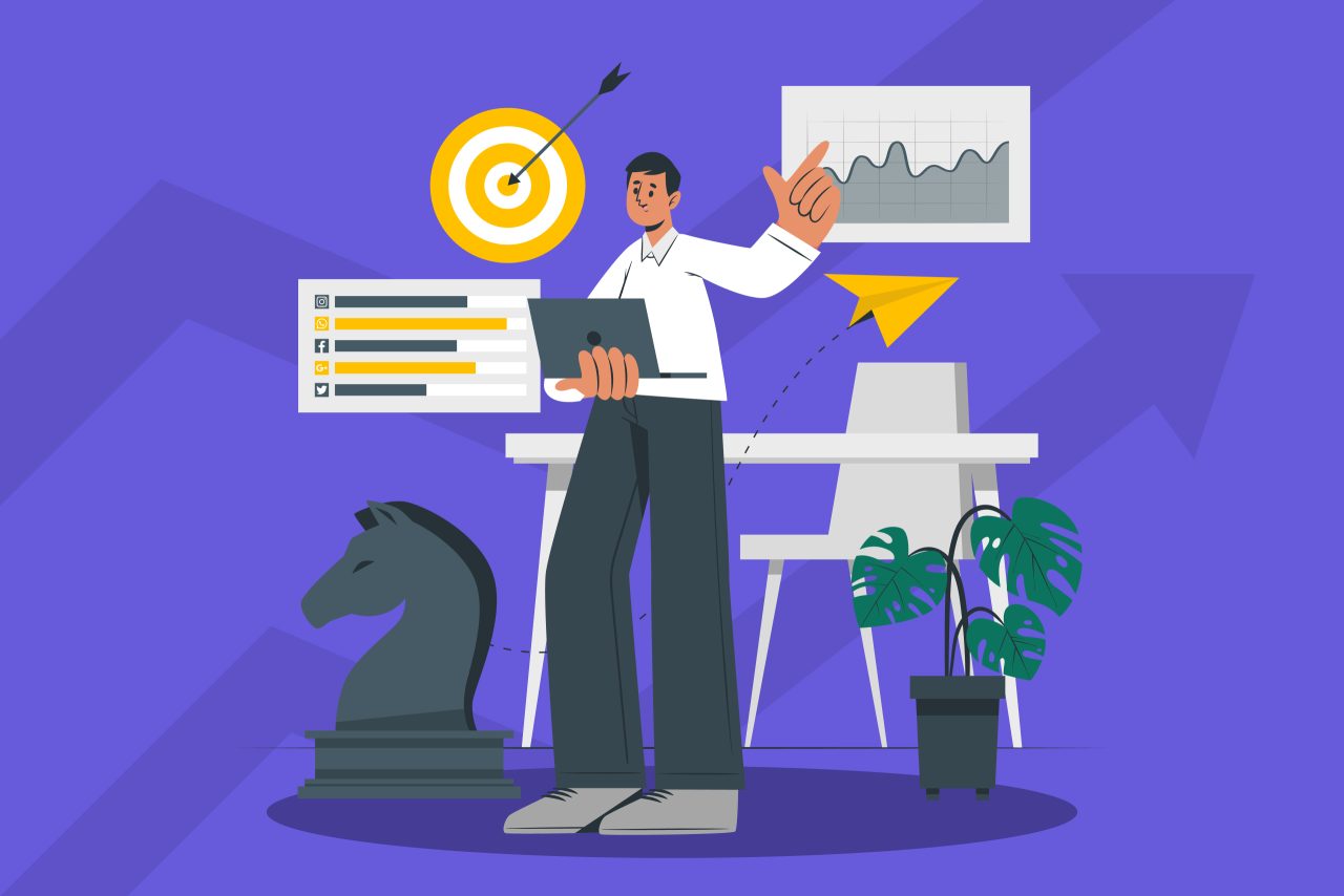 A Digital marketer stands with laptop in hand in a workspace filled with work charts and beautiful decorations.